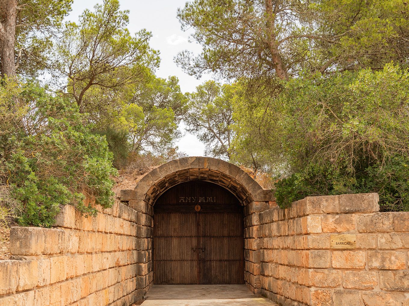 Historic marés stone portal at the entrance of the winery